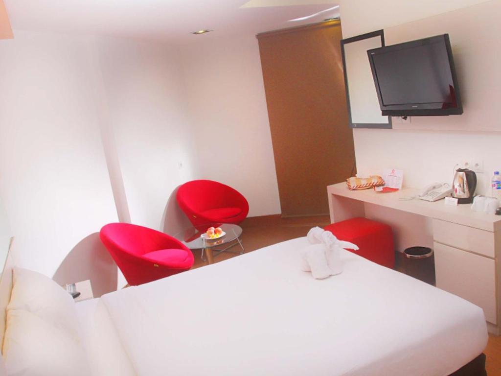 Dragon Inn Kendari Værelse billede